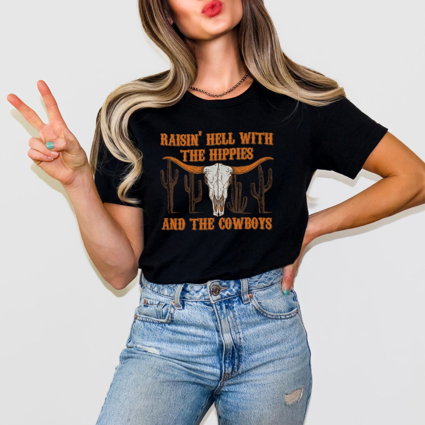 RAISIN' HELL WITH THE HIPPIES AND THE COWBOYS TEE