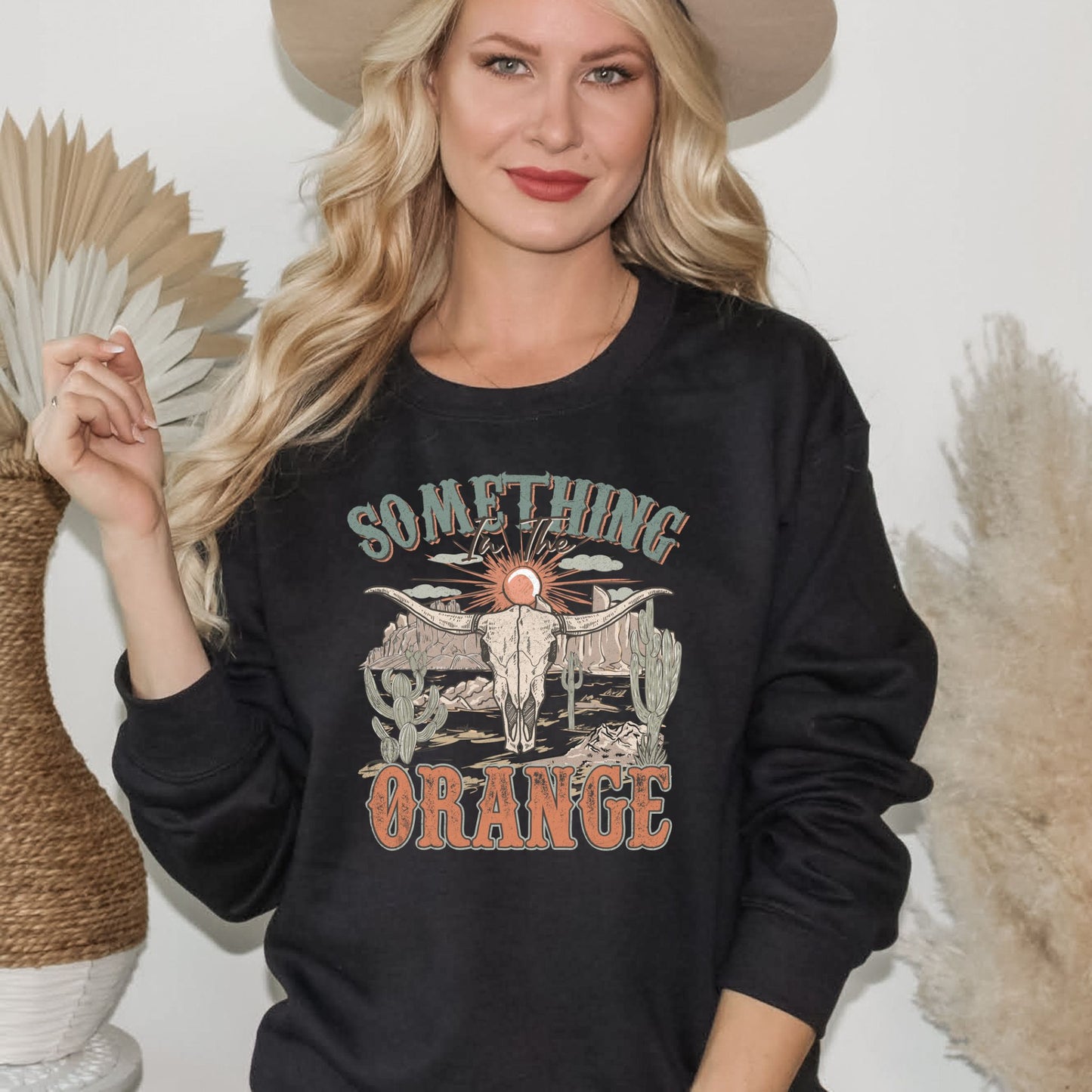 SOMETHING IN THE ORANGE CREWNECK