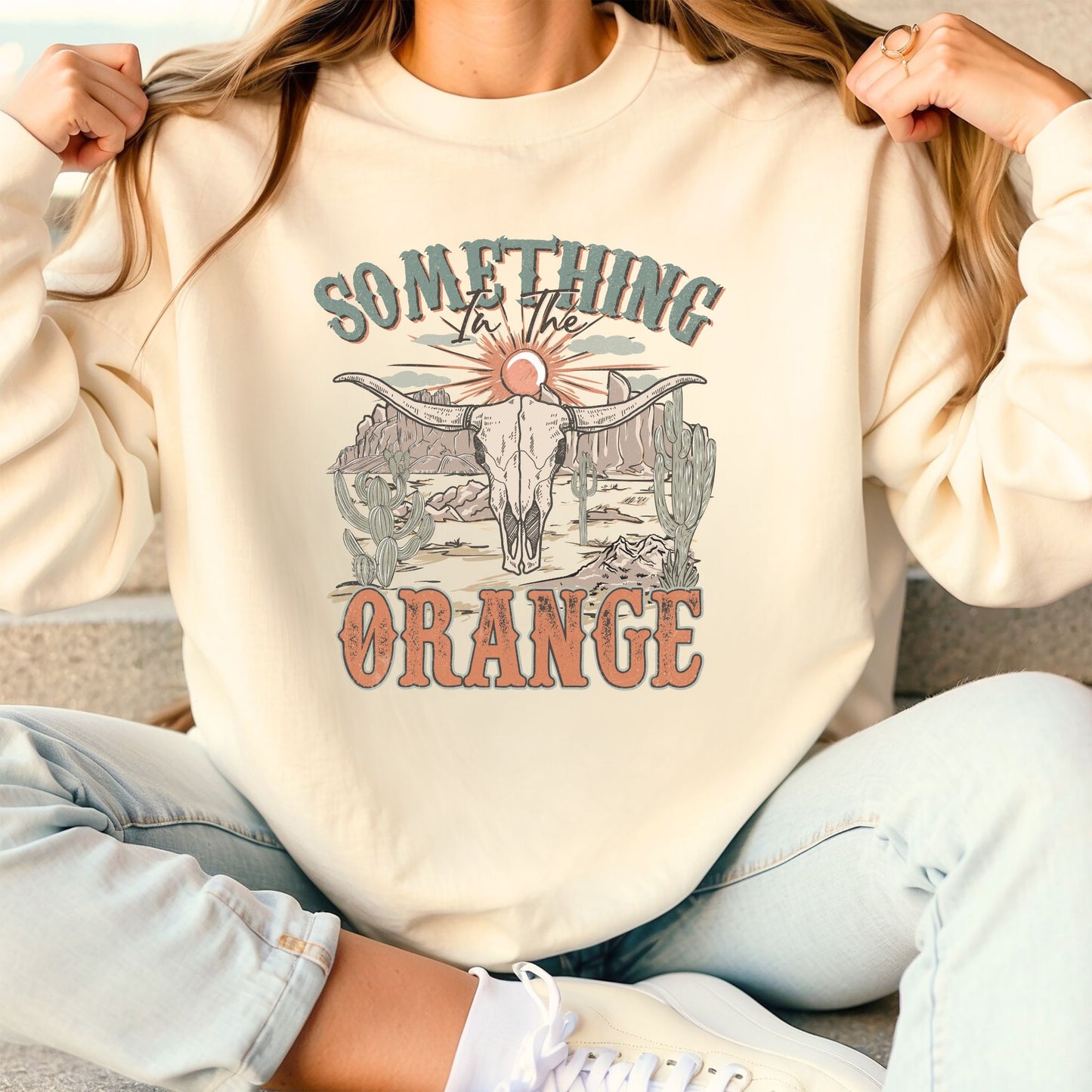 SOMETHING IN THE ORANGE CREWNECK